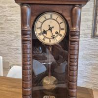 orologio a pendolo a parete