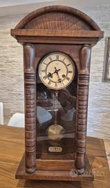orologio a pendolo a parete