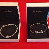 due bracciali pandora argento con charms