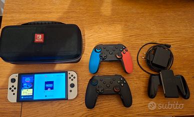 Nintendo Switch Oled + accessori e giochi 