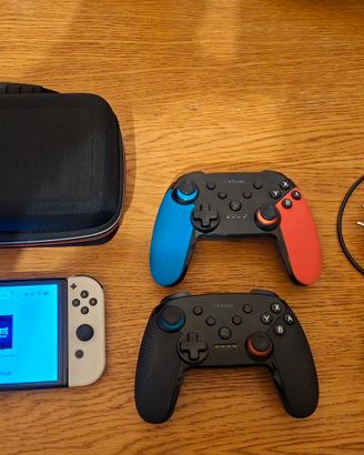 Nintendo Switch Oled + accessori e giochi 