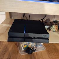 Console Ps4  con 12  giochi e 2 joystick 