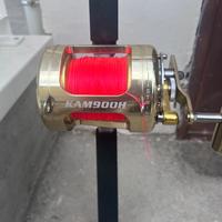 Canna da pesca con mulinello e filo