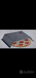 Inserto in acciaio inox per pizza su BBQ