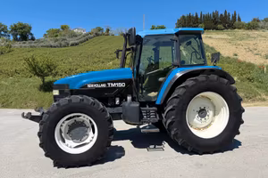 New Holland TM 150 sollevatore e pto anteriore