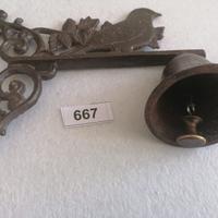 Supporto con campanella e con uccellino