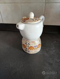 Lotto 11 zuccheriere in ceramica con cucchiaio leg