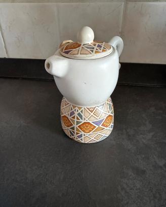 Lotto 11 zuccheriere in ceramica con cucchiaio leg