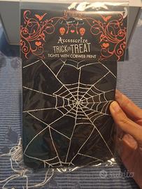 Collant neri con ragnatele per Halloween