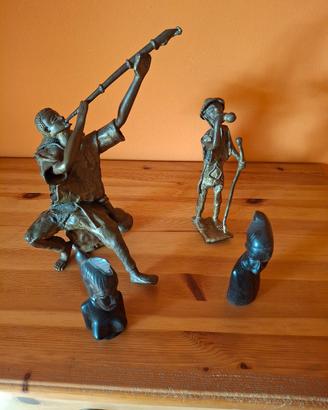 quartetto statue africane