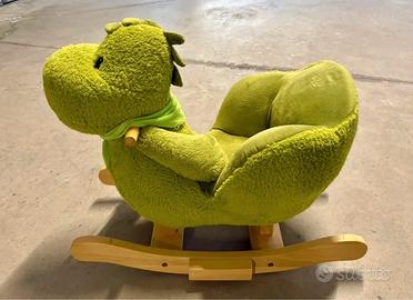 Dondolo per bambini a forma di draghetto verde