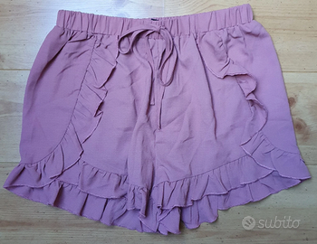 Shorts rosa con volant e fiocco in vita