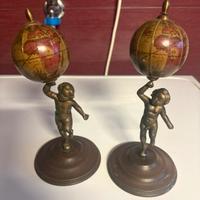 Coppia putti con mappamondo