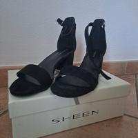 Scarpe aperte col tacco 