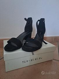 Scarpe aperte col tacco 