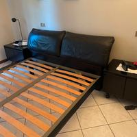 Letto matrimoniale e comodini