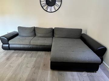 Divano letto con chaise longe e vano contenitore