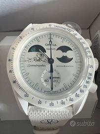 Omega Swatch Mission to Earthphase Moonshine gold