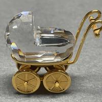 Carrozzina e ferro da stiro Swarovsky