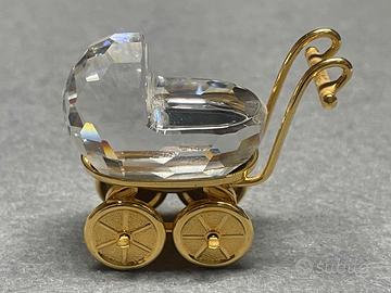 Carrozzina e ferro da stiro Swarovsky