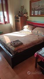 letto a  cassonetto  più due comdini ,nero con co