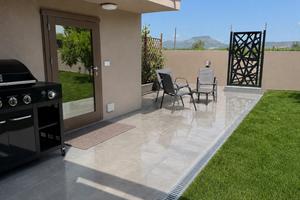 Open space 60mq con patio e giardino privato