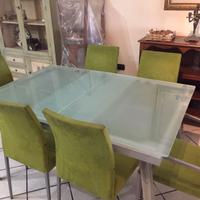 Tavolo in cristallo ed acciaio con 8 sedie