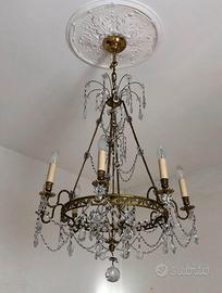 Lampadario 8 luci struttura in bronzo e cristalli.