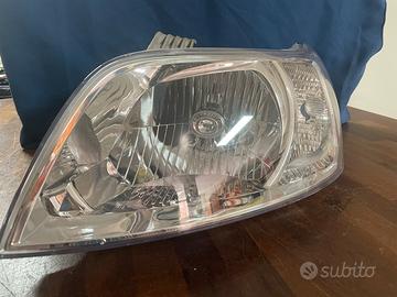 Faro sx Chevrolet Aveo 1,2 LT 2010