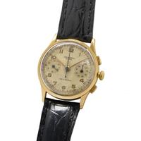 Universal Geneve Compax 35mm oro 18kt cal 285