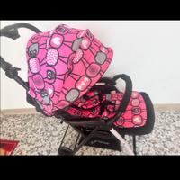 passeggino rosa e nero brevi