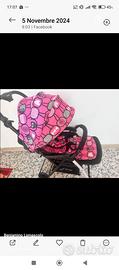 passeggino rosa e nero brevi