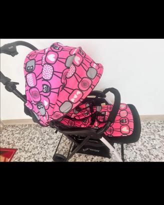 passeggino rosa e nero brevi