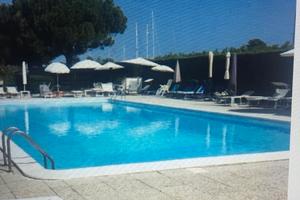 Bilocale con piscina