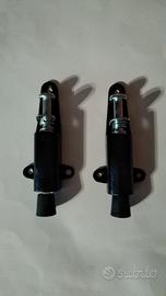 Due fermaporte/portoni