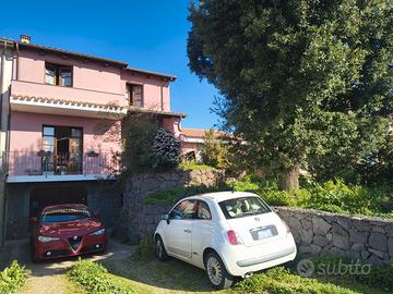 Villetta a schiera con due giardini