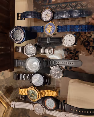 blocco di 12 orologi + smartphone + etichettatrice