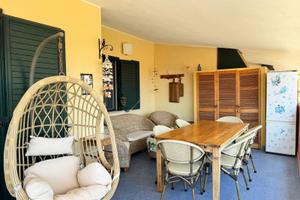 Appartamento con veranda, cantina e posto auto