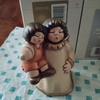 Angelo con bambino Thun Club 2009