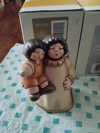 Angelo con bambino Thun Club 2009