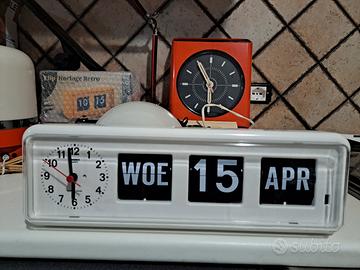 orologio datario a cartellini mobili vintage