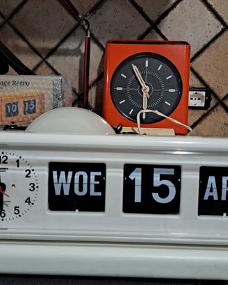 orologio datario a cartellini mobili vintage