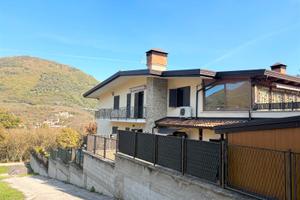 Appartamento con giardino e box auto