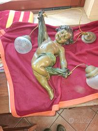 lampadario putto in yerracotta