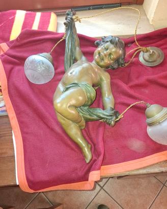 lampadario putto in yerracotta
