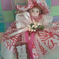 Bambola in porcellana