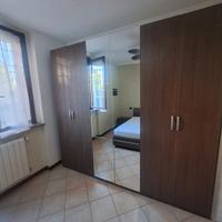 camera da letto armadio-letto contenitore 