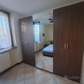 camera da letto armadio-letto contenitore 