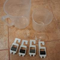 4 caraffe e 4 pinze per pellicole