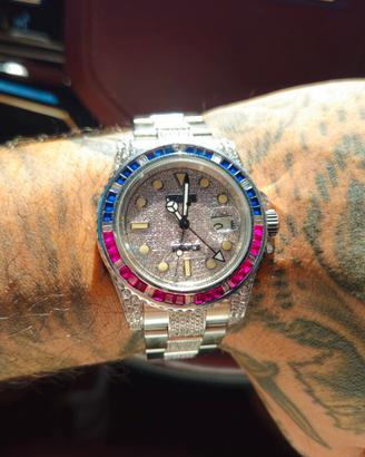 Rolex GMT master 116710LN diamantii zaffiri rubini